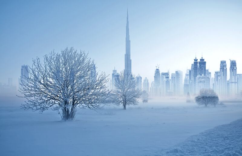 A snowy scene with Burj Khalifa and Downtown Dubai in the background.