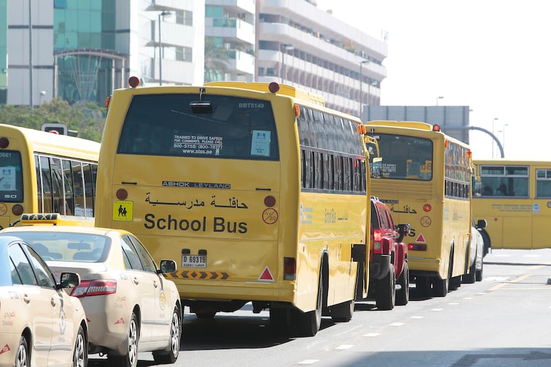 Dubai, United Arab Emirates - February 16, 2014.  School busses ply their routes on a busy afternoon when kids have finished their school duties.  ( Jeffrey E Biteng / The National )  Editor's Note;  Stocks photos.