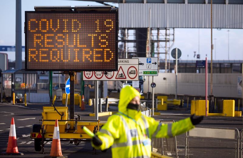 A sign for Covid 19 results required by travelers at the entrance to the Port of Dover. Bloomberg