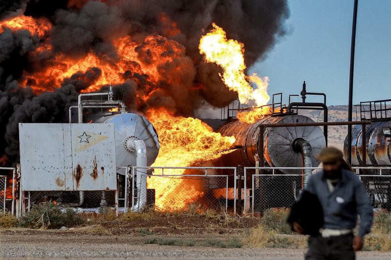 A fire at the Zarba oil facility in north-eastern Syria close to the Turkish border. AFP