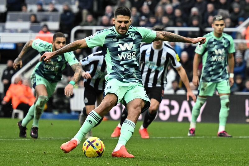 Fulham's Serbian striker Aleksandar Mitrovic takes a penalty and scores, but the goal is disallowed as he kicked the ball onto his standing foot, during the English Premier League football match between Newcastle United and Fulham at St James' Park in Newcastle-upon-Tyne, north-east England on January 15, 2023.  (Photo by Oli SCARFF / AFP) / RESTRICTED TO EDITORIAL USE.  No use with unauthorized audio, video, data, fixture lists, club/league logos or 'live' services.  Online in-match use limited to 120 images.  An additional 40 images may be used in extra time.  No video emulation.  Social media in-match use limited to 120 images.  An additional 40 images may be used in extra time.  No use in betting publications, games or single club/league/player publications.   /  