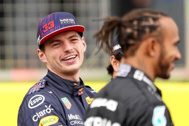 File photo dated 15-07-2021 of Red Bull Racing's Max Verstappen with Mercedes driver Lewis Hamilton. Issue date: Tuesday July 27, 2021 .