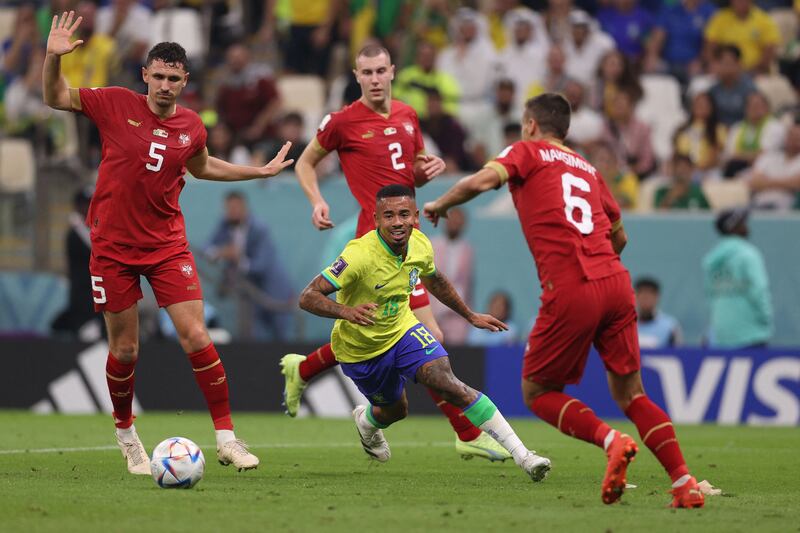 Gabriel Jesus takes on the Serbian defence. AFP