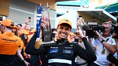 MIAMI, FLORIDA - MAY 05: Race winner Lando Norris of Great Britain and McLaren celebrates with his trophy after the F1 Grand Prix of Miami at Miami International Autodrome on May 05, 2024 in Miami, Florida.    Clive Mason / Getty Images / AFP (Photo by CLIVE MASON  /  GETTY IMAGES NORTH AMERICA  /  Getty Images via AFP)