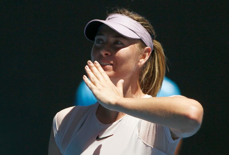 Tennis - Australian Open - Rod Laver Arena, Melbourne, Australia, January 18, 2018. Maria Sharapova of Russia celebrates winning against Anastasija Sevastova of Latvia. REUTERS/Thomas Peter