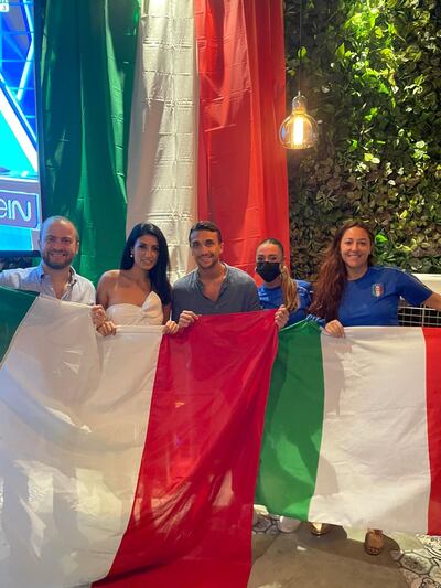 Paolo Nazzari (centre) celebrates with fellow Italians in Dubai after they beat England in the Euro 2020 final.