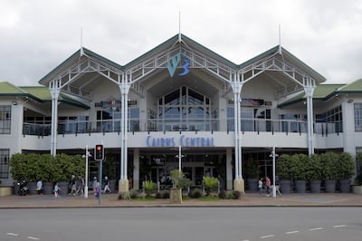 Pedestrians walk past the Cairns Central shopping centre in Cairns, Australia, on Monday, July 31, 2017. Australia's stocks and bonds are rallying in August, and economic data mostly continue to surprise in a good way. But a constitutional crisis undermining the government, and the prospect of even higher household power bills threaten to hurt already weak consumer sentiment. Photographer: Carla Gottgens/Bloomberg