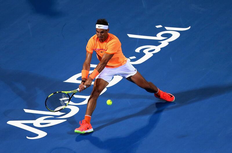 ABU DHABI, UNITED ARAB EMIRATES - DECEMBER 29:  Rafael Nadal of Spain in action during his men's singles match against Tomas Berdych of the Czech Republic on day one of the Mubadala World Tennis Championship at Zayed Sport City on December 29, 2016 in Abu Dhabi, United Arab Emirates.  (Photo by Francois Nel/Getty Images)