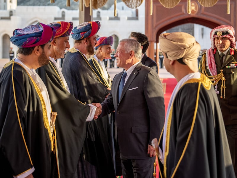 Jordan's King Abdullah II greets dignitaries upon his arrival in Oman. Photo: Oman News Agency