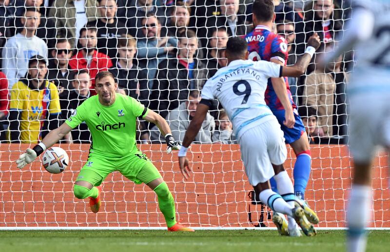 Pierre-Emerick Aubameyang beats Crystal Palace's Spanish goalkeeper Vicente Guaita to score. AFP