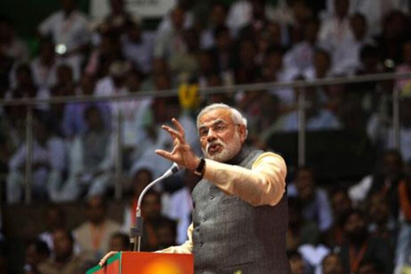 India's main opposition Bharatiya Janata Party leader, Narendra Modi, speaks during the party’s National Council in New Delhi on Sunday. Tsering Topgyal / AP Photo