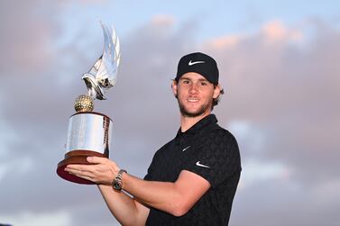 ABU DHABI, UNITED ARAB EMIRATES - JANUARY 23: Championship winner Thomas Pieters of Belgium poses with the trophy as he celebrates after winning the Final Round of the Abu Dhabi HSBC Championship at Yas Links Golf Course on January 23, 2022 in Abu Dhabi, United Arab Emirates. (Photo by Ross Kinnaird / Getty Images)