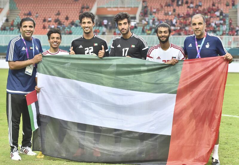 <p>UAE celebrate their 4-3 penalty shoot-out win over Vietnam to win the bronze medal match at the 2018 Asian Games. Courtesy UAE FA</p>
