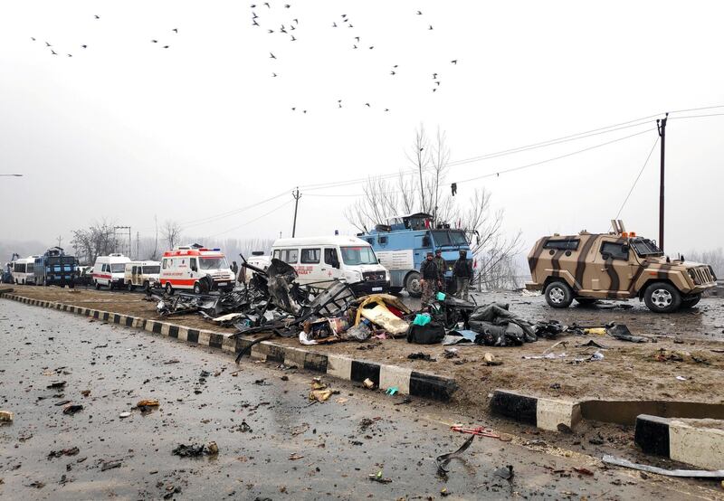 Indian soldiers examine the debris after an explosion in Lethpora in south Kashmir's Pulwama district. Reuters