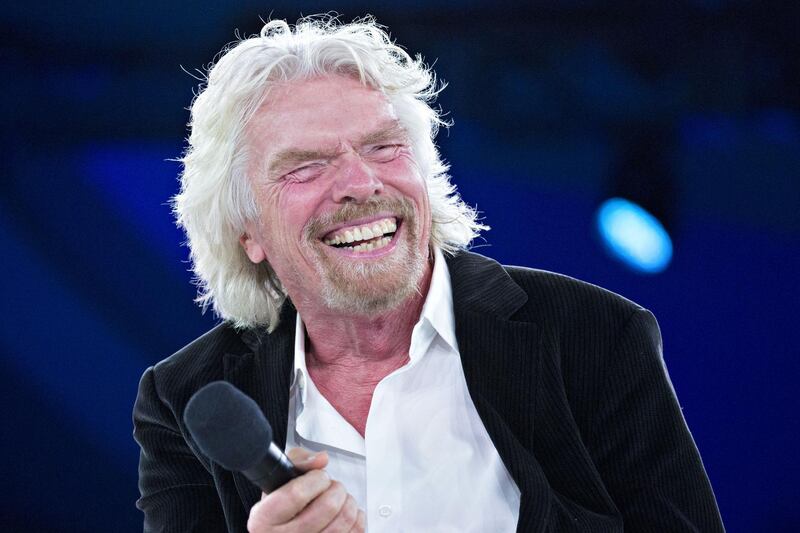 Billionaire Richard Branson, founder and president of Virgin Atlantic Airways Ltd., laughs during a discussion at the Goldman Sachs 10,000 Small Businesses Summit in Washington, D.C., U.S., on Tuesday, Feb. 13, 2018. Goldman's 10,000 Small Businesses is an investment that brings economic opportunity and assists entrepreneurs to create jobs by providing better access to education, capital and business support services. Photographer: Andrew Harrer/Bloomberg