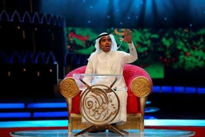 Kuwait's Nasser Al Ajami recites his poem during the final episode of the talent show Million's Poet in Abu Dhabi in 2010. Marwan Naamani / AFP
