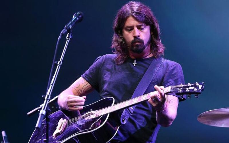 SAN FRANCISCO, CA - SEPTEMBER 12: Dave Grohl of the Foo Fighters performs during an Apple special event at the Yerba Buena Center for the Arts on September 12, 2012 in San Francisco, California. Apple announced the iPhone 5, the latest version of the popular smart phone.   Justin Sullivan/Getty Images/AFP== FOR NEWSPAPERS, INTERNET, TELCOS & TELEVISION USE ONLY ==

