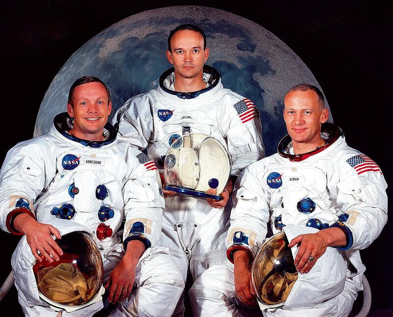 This May 1969 photo shows the astronaut crew of the Apollo XI lunar landing mission. Left to right, are Neil A. Armstrong, commander; Michael Collins, command module pilot; and Edwin E. Aldrin Jr., lunar module. (Photo by - / NASA / AFP) / RESTRICTED TO EDITORIAL USE - MANDATORY CREDIT "AFP PHOTO / NASA " - NO MARKETING - NO ADVERTISING CAMPAIGNS - DISTRIBUTED AS A SERVICE TO CLIENTS
