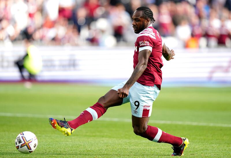 West Ham substitute Michail Antonio makes it 3-1. PA