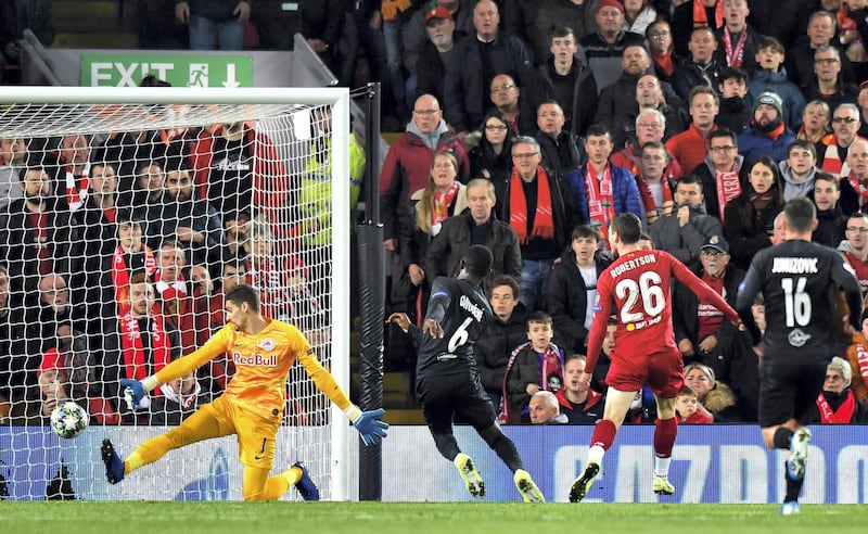 Liverpool's Andrew Robertson (second right) scores his side's second goal of the game