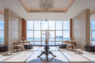 The floor-to-ceiling glass walls at Radisson Resort Ras Al Khaimah offer views of the azure waters. Photo: Supplied