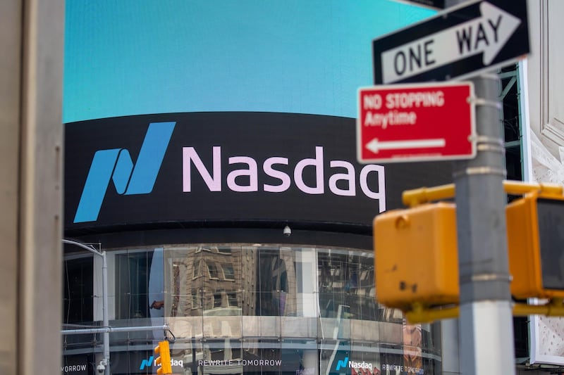 Signage is displayed outside the Nasdaq MarketSite in the Times Square neighborhood of New York, U.S., on Monday, July 20, 2020. U.S. stocks fluctuated in light trading as investors are keeping an eye on Washington, where lawmakers will begin hammering out a rescue package to replace some of the expiring benefits earlier versions contained. Photographer: Michael Nagle/Bloomberg