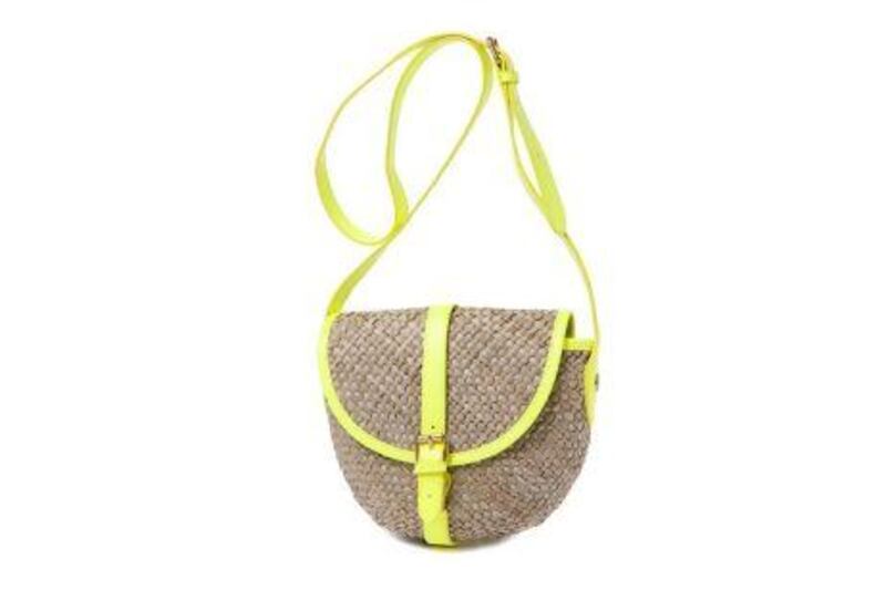 Marc by Marc Jacobs Canteen woven seagrass cross-body bag. Courtesy Marc by Marc Jacobs