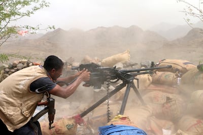 epa06912151 A member of Yemeni government forces fires a heavy machine gun during an offensive against Houthi positions on the outskirts of the western port city of Hodeidah, Yemen, 26 July 2018. According to reports, Yemen has been engulfed in a violent conflict between the Saudi-backed government and Houthi rebels since 2015, while UN Special Envoy to Yemen Martin Griffiths tires to push for a deal with Houthi militia leaders to cede control of the Red Sea port of Hodeidah to a UN-supervised committee, in an attempt to end the Saudi-led coalition assault on Hodeidah city.  EPA/NAJEEB ALMAHBOOBI