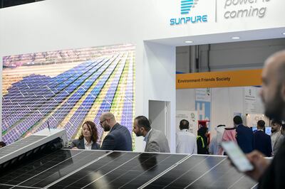 Solar panels display at SunPure stand during Abu Dhabi Sustainability Week in Adnec, Abu Dhabi. Khushnum Bhandari / The National 