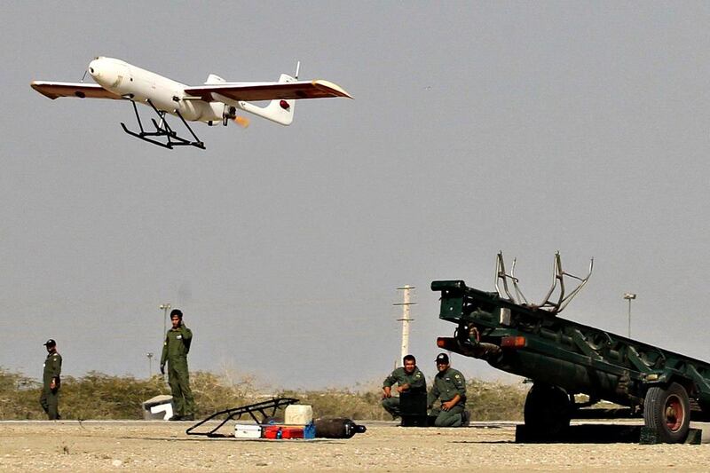 Iranian soldiers launch a made drone during a military drill in the southern port city of Bandar Jask in a photo released on December 25, 2014. Chavosh Homavandi / Jamejam Online / AFP