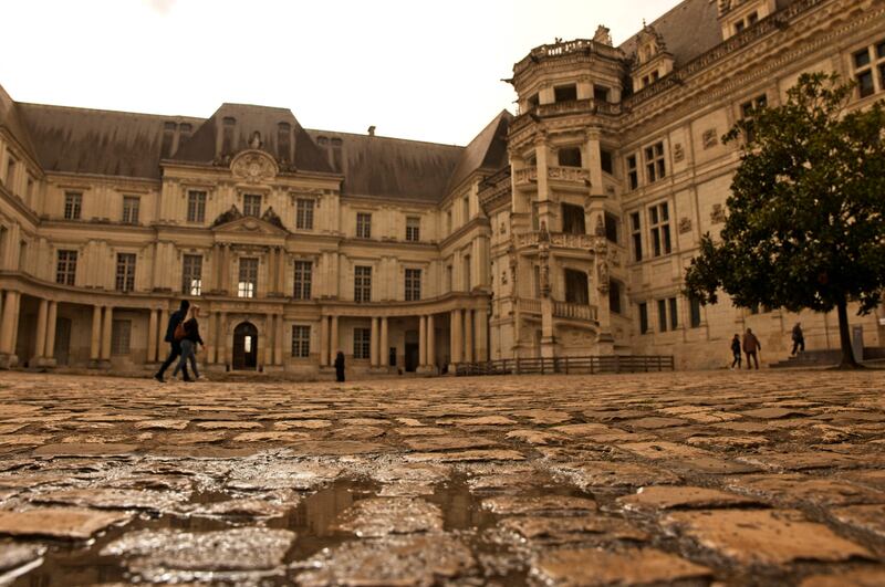 Blois castle, France, is covered in orange sand. AFP