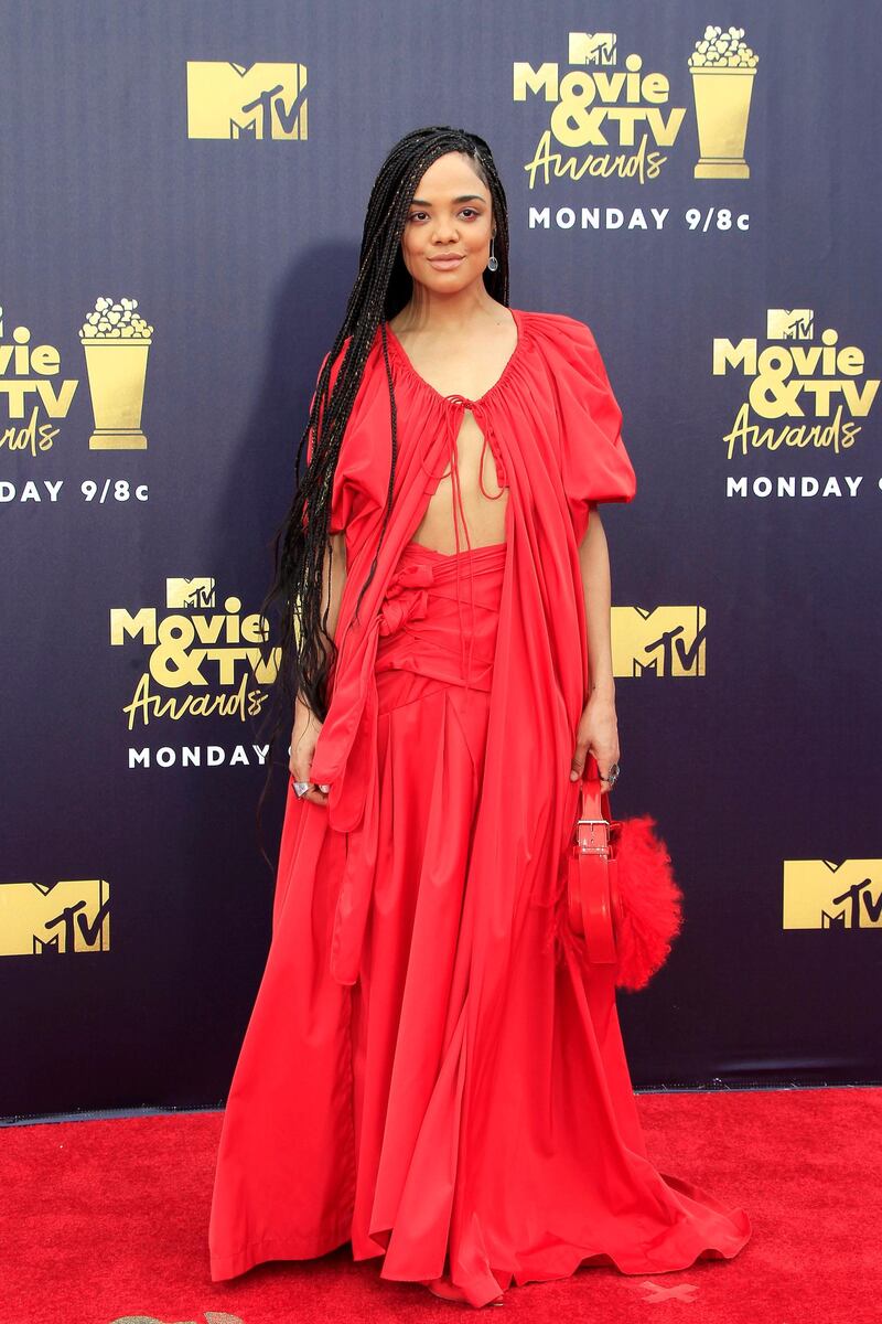 MISS
Actress Tessa Thompson went for a very Lisa Bonet circa 1990 appeal in this red look by Rosie Assoulin. I love the vivid colour on her, and that is was a separate skirt and cape with a daring tie in front, but without the colour co-ordination with co-star Stanfield, she looked swamped in it