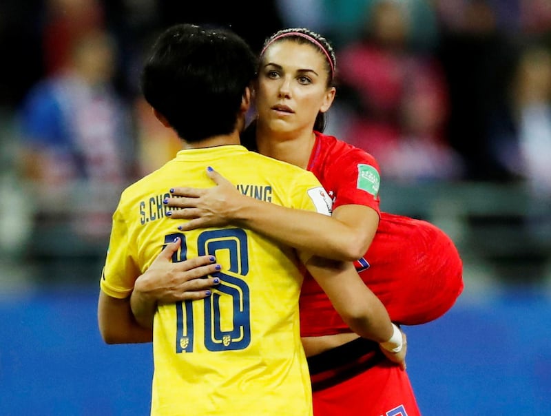 Alex Morgan of the US with Thailand's Sukanya Chor Charoenying after the match. Reuters