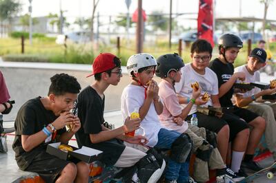 Participants enjoy a snack. Khushnum Bhandari / The National 
