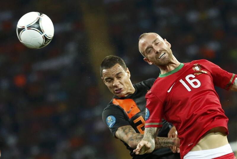 Defender Gregory Van der Wiel, left, was not included in the Dutch World Cup 2014 squad. Vasily Fedosenko / Reuters 