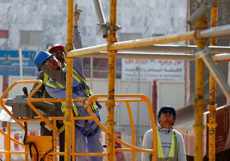 Foreign labourers working at the construction site of a building in Riyadh, Saudi Arabia. Faisal Al Nasser/Reuters