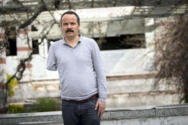 Veli Sacilik poses for a photograph in Ankara.