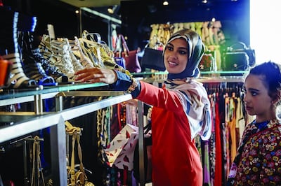 Visitors browse the discounts at Bicester Village. Courtesy Bicester Village