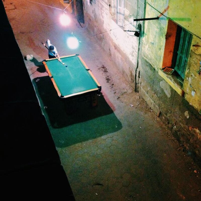 Late night walk. Outdoor billiards. Classic Cairo moment. Photo by Christina Rizk (@christinarizk).