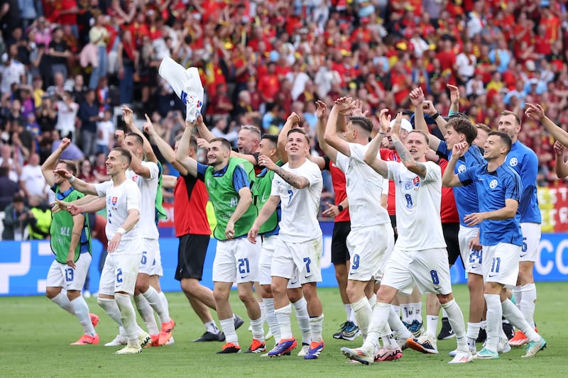 Slovakia players celebrate after defeating Belgium. Getty Images