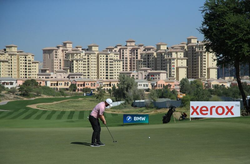 English golfer Andy Sullivan putts on the sixth green on his way to a new course record 61 during Day 1 of the Golf in Dubai Championship at Jumeirah Golf Estates on December 2. Getty