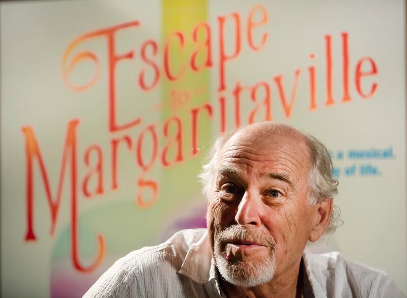 FILE - Jimmy Buffett talks about the premiere of "Escape to Margaritaville" at the Saenger Theater in New Orleans on Monday, June 12, 2017.  Buffett, who popularized beach bum soft rock with the escapist Caribbean-flavored song “Margaritaville” and turned that celebration of loafing into an empire of restaurants, resorts and frozen concoctions, has died, Friday, Sept.  1, 2023.  (Chris Granger  / The Times-Picayune / The New Orleans Advocate via AP)