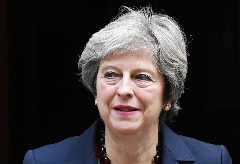 epa06287948 British Prime Minister Theresa May departs 10 Downing Street for Prime Minister Questions at parliament in London, Britain, 25 October  2017.  EPA/ANDY RAIN