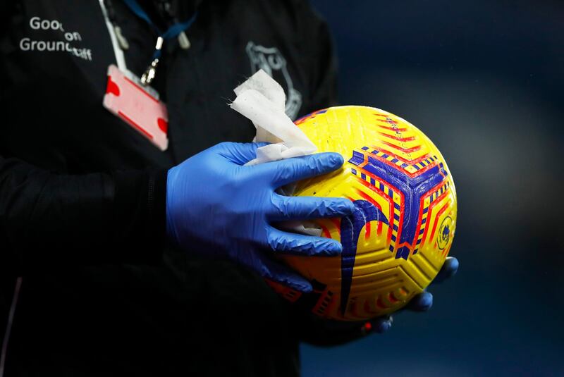 A Nike flight hi vis match ball is disinfected during the Premier League match between Everton and Fulham at Goodison Park in Liverpool, England. Getty Images