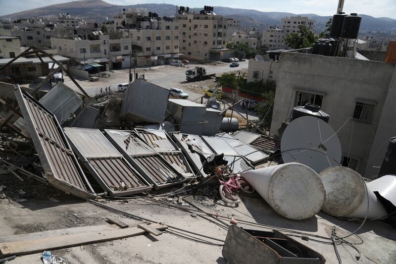 The home of Abdel Fatah Kharousha, who was killed in an Israeli raid in Jenin in March, is destroyed in Askar refugee camp in Nablus, the occupied West Bank. AP