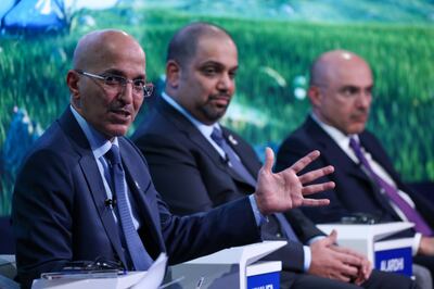 Saudi Arabia's Finance Minister Mohammed Al Jadaan (L) speaks during a panel session with Bahrain's Finance and National Economy Minister Sheikh Salman bin Khalifa and Investcorp executive chairman Mohammed Alardhi (R) on the opening day of the World Economic Forum in Davos. Bloomberg