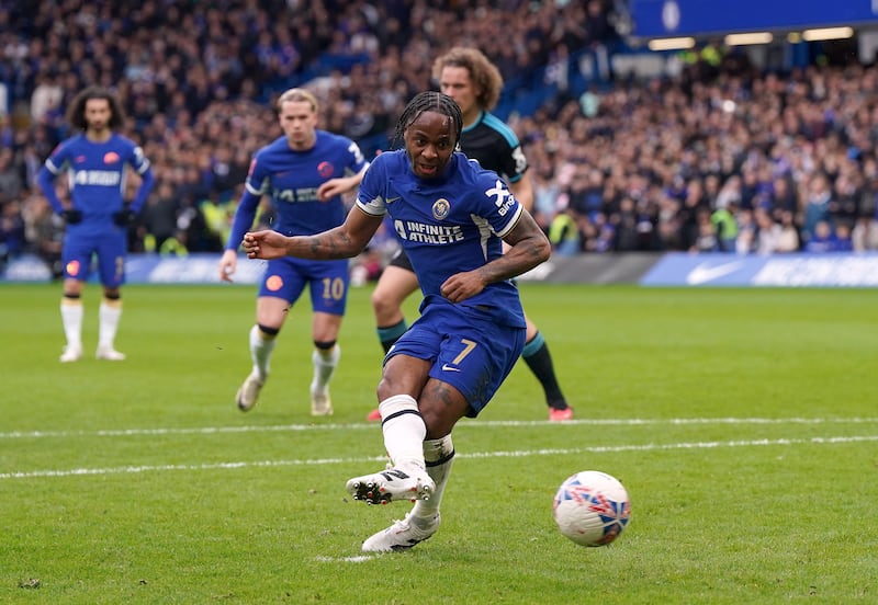 Chelsea's Raheem Sterling misses from the penalty spot in the first half. PA