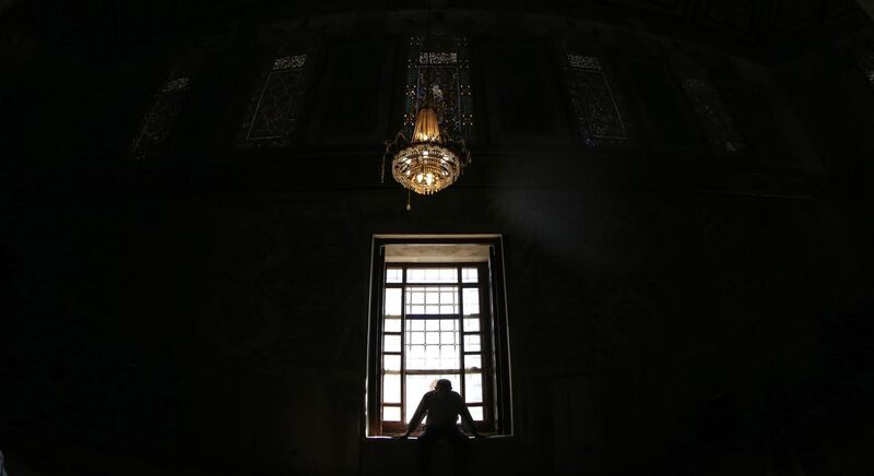 A Palestinian man prays at al-Aqsa Mosque in Jerusalem. EPA