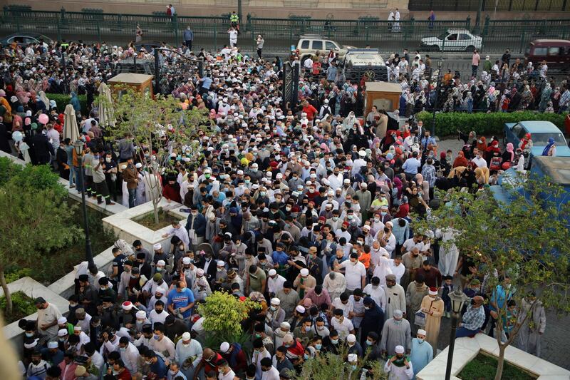 Egyptians arrive for Eid Al Fitr prayers at Al Azhar mosque in Cairo. EPA
