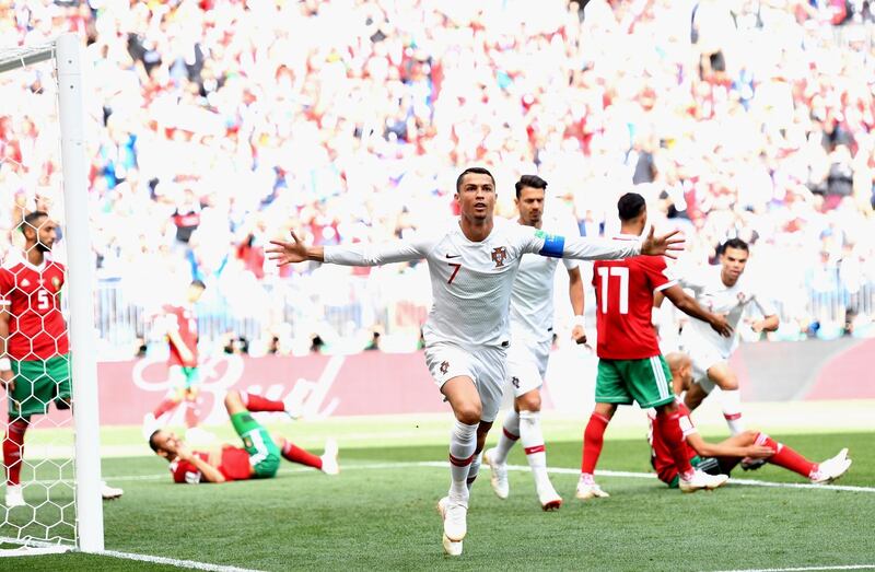 Cristiano Ronaldo celebrates after scoring Portugal's goal against Morocco. Peter Powell / EPA